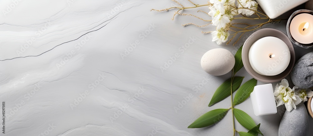 Poster a serene spa scene with a selection of elegantly arranged elements like a cotton branch stones towel