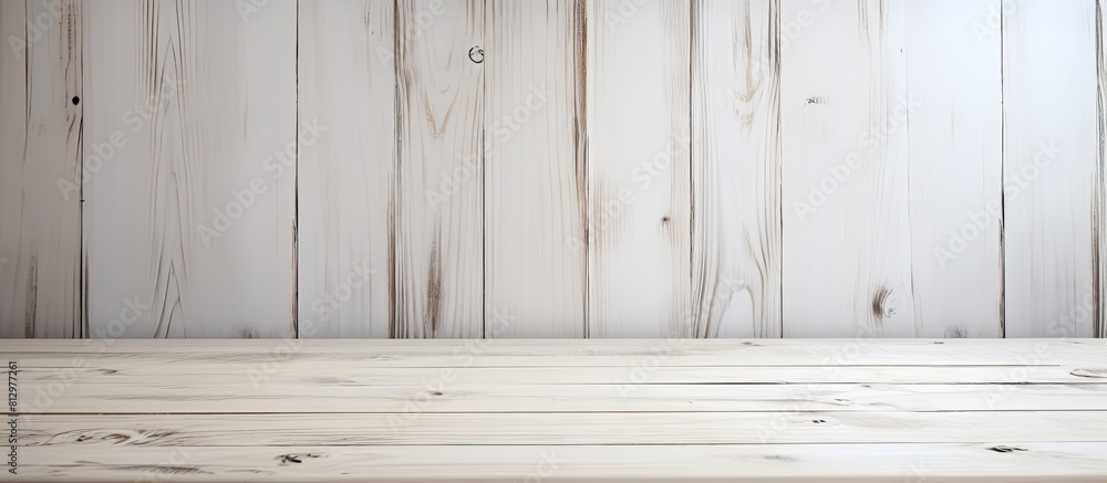 Poster a white wood background frames an empty wooden table providing copy space for displaying text design