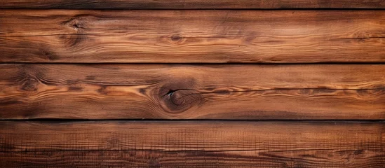 A copy space image featuring the texture of a wooden background © StockKing