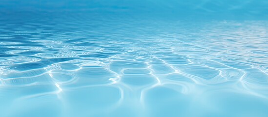 A clear blue swimming pool s close up with copy space image