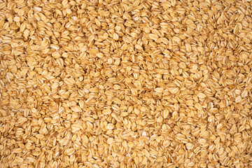Oat-flakes as a background. Top view.