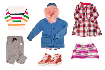 Collage set of little girl autumn or spring clothes isolated on white. Kids apparel collection. Childs fashion clothing outfit. Jeans jacket, skirt, shirt, dresses and shoes.