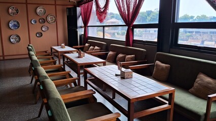 tables and chairs in a restaurant
