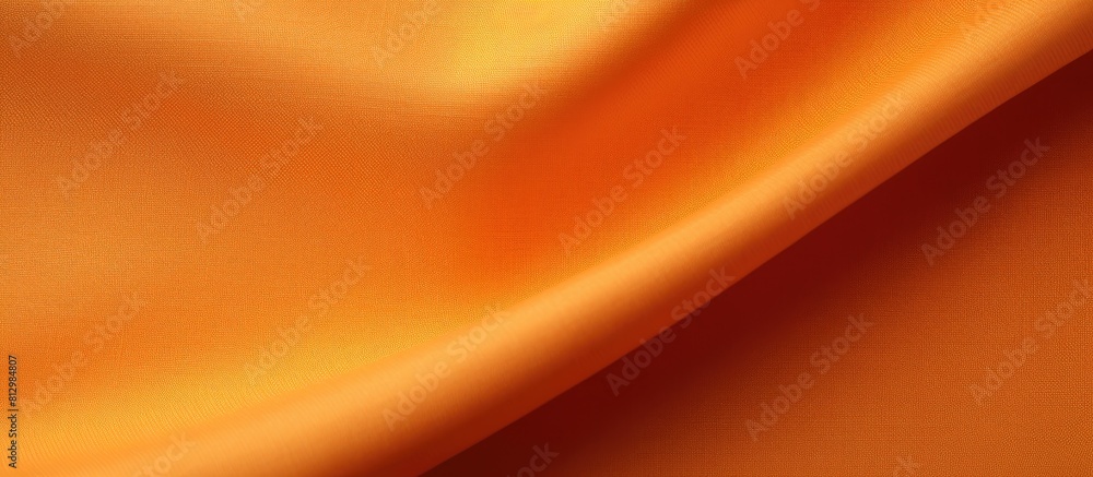 Poster closeup view of an orange textile table napkin showing its texture in the copy space image