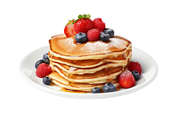 A delicious breakfast of pancakes, topped with fresh strawberries, blueberries and raspberries.