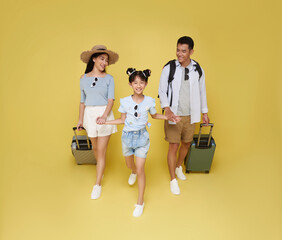 Happy fun asian family vacation portrait. Father, mother and daughters ready for travel flight with...