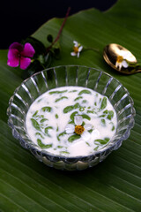 Lod Chong, Thai dessert placed on banana leaf background. Thai dessert with a sweetness that is...