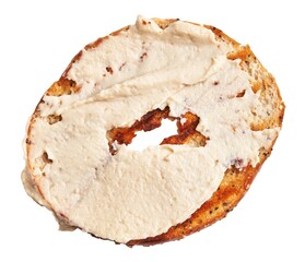 Top view of a cream cheese spread bagel isolated on white background