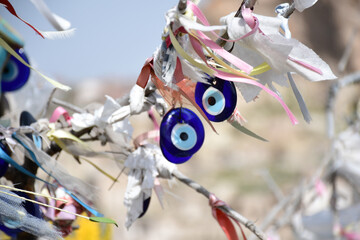 Warding Off Evil: The Charm of Turkish Evil Eye Amulets on Dilek Ağacı in Cappadocia