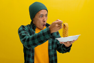 Asian man in a beanie and casual clothes makes a surprised and delighted expression while slurping...