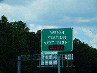 Highway weigh station sign, closed notification.