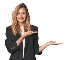 Young businesswoman in a suit excited holding a copy space on palm.