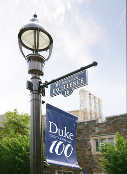 Durham, NC - USA - 4-30-2024: We Believe In Excellence sign and Centennial banner on the campus of Duke University