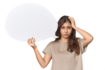 Middle Eastern woman holding comic bubble being shocked, she has remembered important meeting.