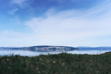 Helgøya Island seen from a Sunday walk between Panengen and Evjua by Lake Mjosa a day of May 2024.