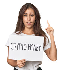 Middle Eastern woman with crypto sign having some great idea, concept of creativity.