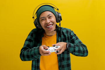 An enthusiastic Asian gamer, adorned in a beanie hat, casual shirt, and headphones, celebrates...