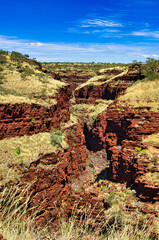 View of the deep, narrow Weano Gorge, carved into re, iron-rich layered rocks, Karijini National Park, Pilbara, Western Australia

