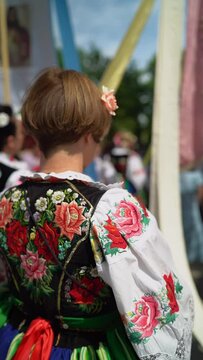 Łowicz Corpus Christi celebration. Woman in traditional Masovian costumes. Slow motion video. Polish folklore	