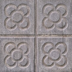 Background with Barcelona panots or Barcelona flowers, typical modernist tiles of the pavement on Barcelona streets