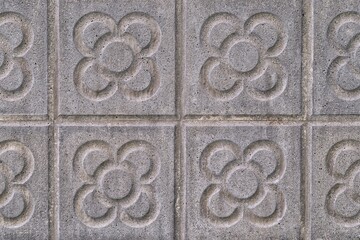 Background with Barcelona panots or Barcelona flowers, typical modernist tiles of the pavement on...