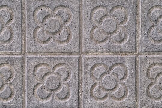 Background with Barcelona panots or Barcelona flowers, typical modernist tiles of the pavement on Barcelona streets