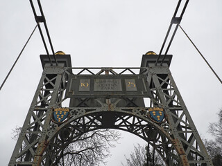Queens Park Suspension Bridge crossing the river Dee in Chester