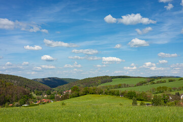 Obraz premium view to the village Mosbach and the surrounding Thuringian Forest
