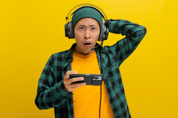 an Annoyed Asian man, dressed in a beanie hat and casual shirt, displays frustration and...