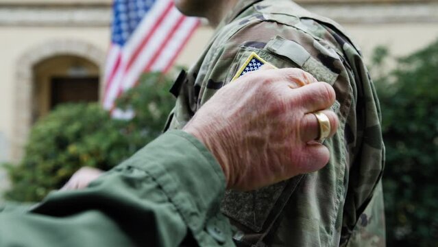 General Instills Valor In American Serviceman With Flag For His Service