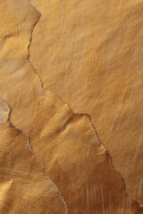 Gold, bronze paper paper crumble torn frame painting wall. Abstract glow texture copy space relief...