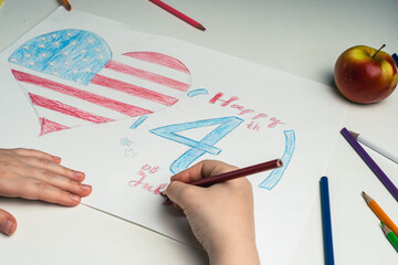Congratulations on the Independence Day of America are drawn by the hands of a child. The flag of...