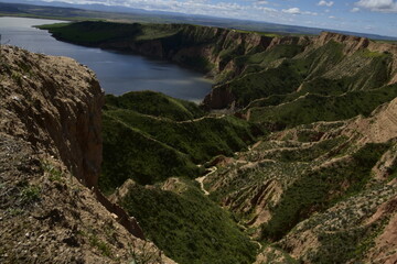 photographs of beautiful landscapes with cliffs and water lagoon