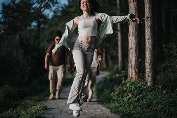 Young adults feeling joyful and carefree during an outdoor walk in nature, expressing happiness and...