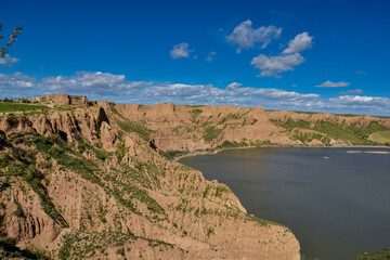 photographs of beautiful landscapes with lagoons and white clouds,