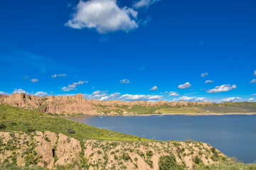 photographs of beautiful landscapes with lagoons and white clouds,