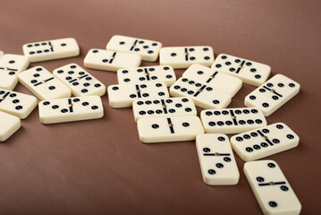 Dominoes with brown background, copy space and various angles