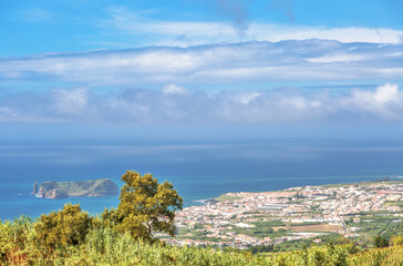View on mountains, valleys, sea coastline of Sao Miguel island