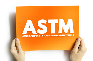 ASTM -American Society for Testing and Materials is an international standards organization, text concept on card