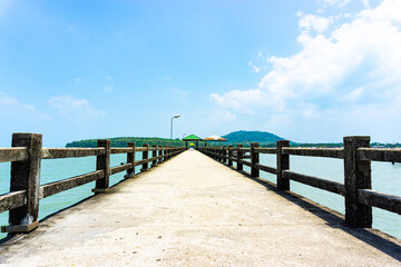 Fototapeta premium Old Metal and Cement Pier, Bridge to the Sea Between Islands