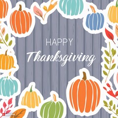Happy Thanksgiving greeting text with colorful pumpkins, squash and leaves over dark grey wooden background