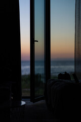 window joinery - a beautiful view with the reflection of the sunset