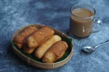 bolang baling or Odading or Galundeng is a traditional sweet made from flour and sugar in deep fried, fried bread in cubes or blocks, with a light brown crunchy outer skin. Indonesian food. 