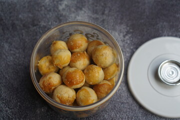 Nastar Cookies, Pineapple tarts or nanas tart are small, bite-size pastries filled or topped with pineapple jam, commonly found when Hari Raya or Eid Al Fitr or Lebaran. Selective focus.