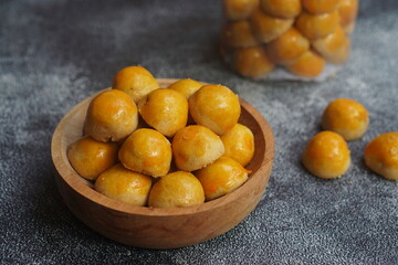Nastar Cookies, Pineapple tarts or nanas tart are small, bite-size pastries filled or topped with pineapple jam, commonly found when Hari Raya or Eid Al Fitr or Lebaran. Selective focus.
