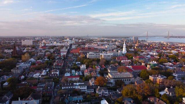 Charleston, South Carolina, USA, aerial cinematic sunset view.