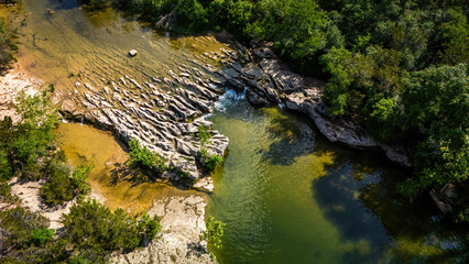 Scenic aerial view of Sculpture Falls via Barton Creek Greenbelt Trail