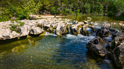 Scenic aerial view of Sculpture Falls via Barton Creek Greenbelt Trail