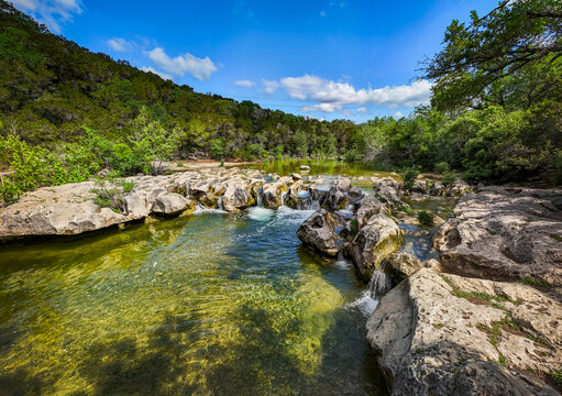 Scenic aerial view of Sculpture Falls via Barton Creek Greenbelt Trail