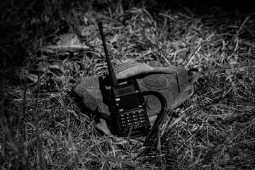 Military gear, tactical gloves and a walkie-talkie.
Individual protection of the military, tactical...